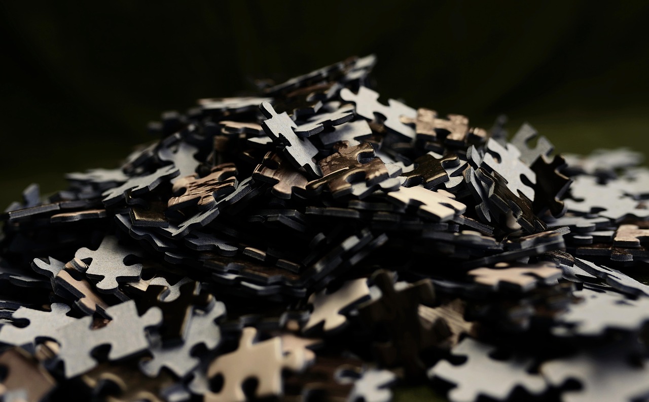 A jigsaw puzzle partly assembled on a table